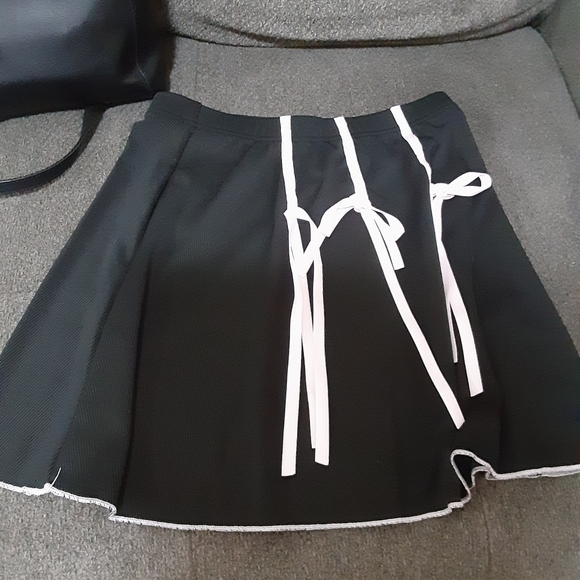 Tied Ribbed skirt with pink ribbons - Picture 2 of 2